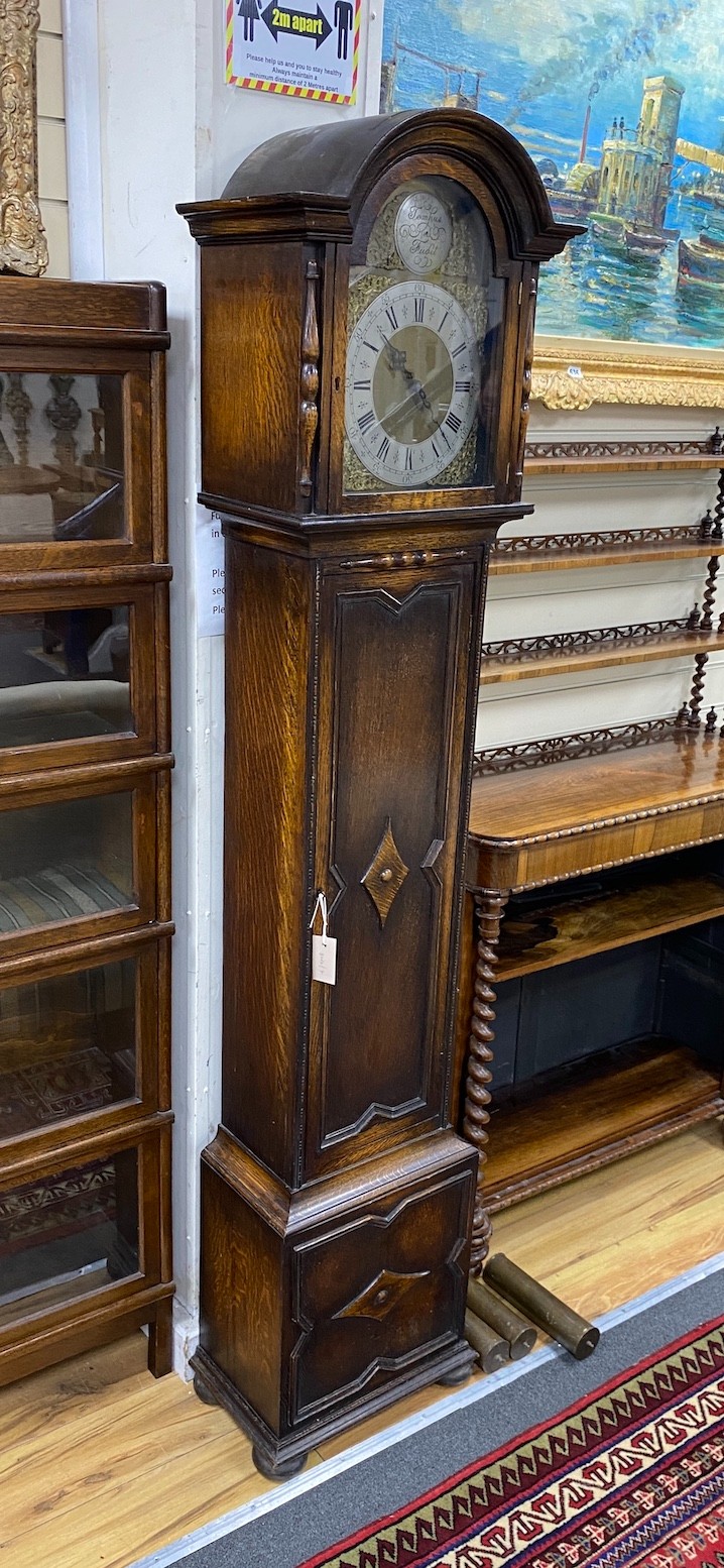 A 1920's oak longcase clock, height 194cm